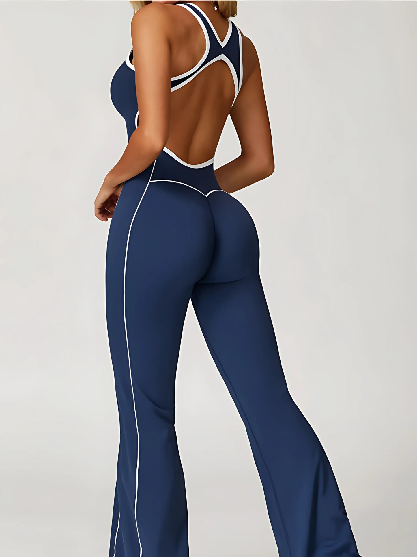 The Élan Flare Jumpsuit — Sculpting Pilates One-Piece with Open Back