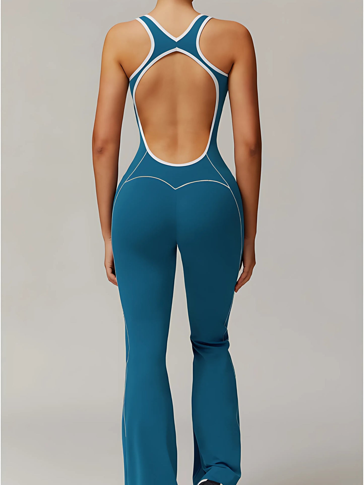 The Élan Flare Jumpsuit — Sculpting Pilates One-Piece with Open Back