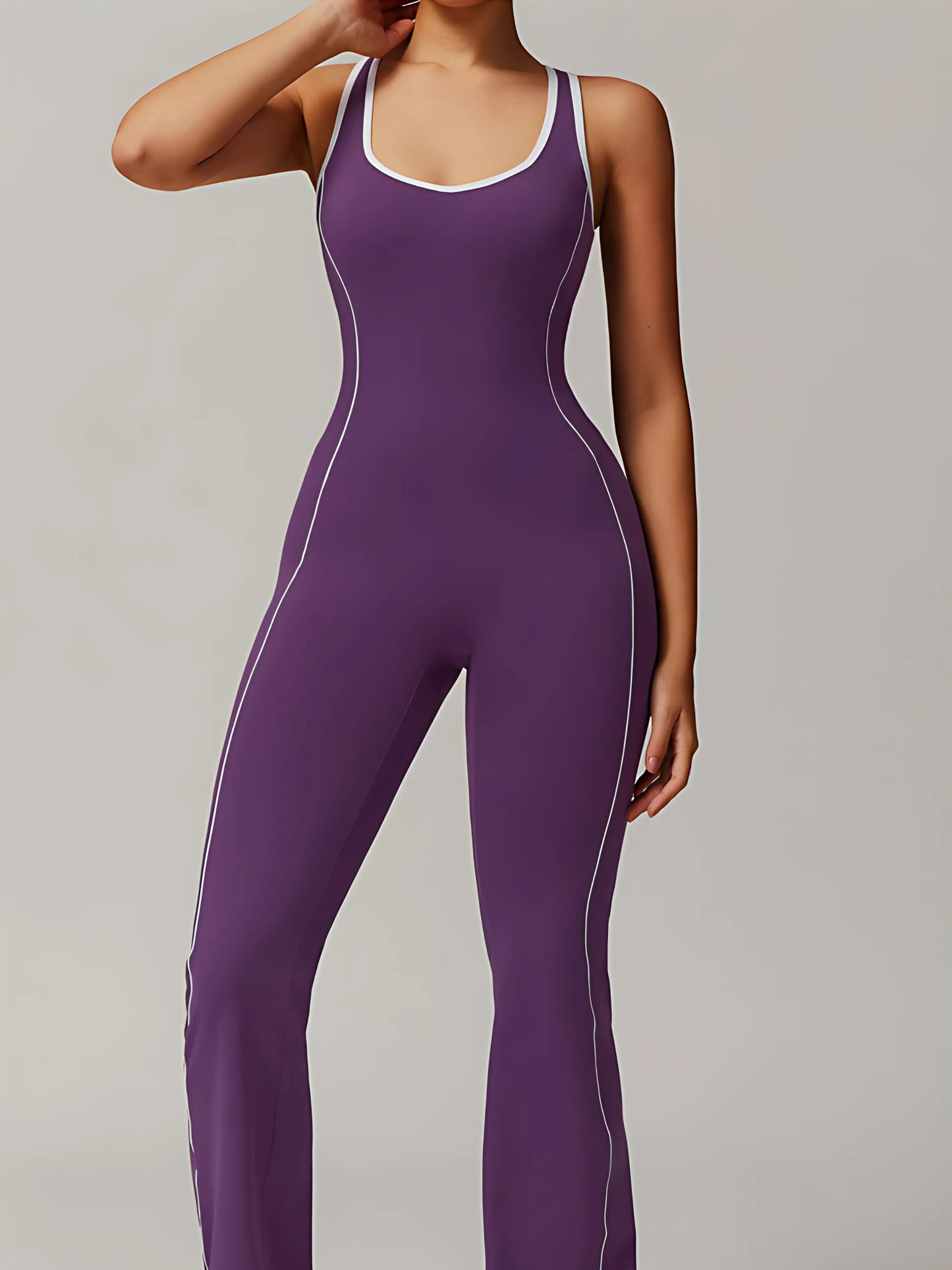 The Élan Flare Jumpsuit — Sculpting Pilates One-Piece with Open Back