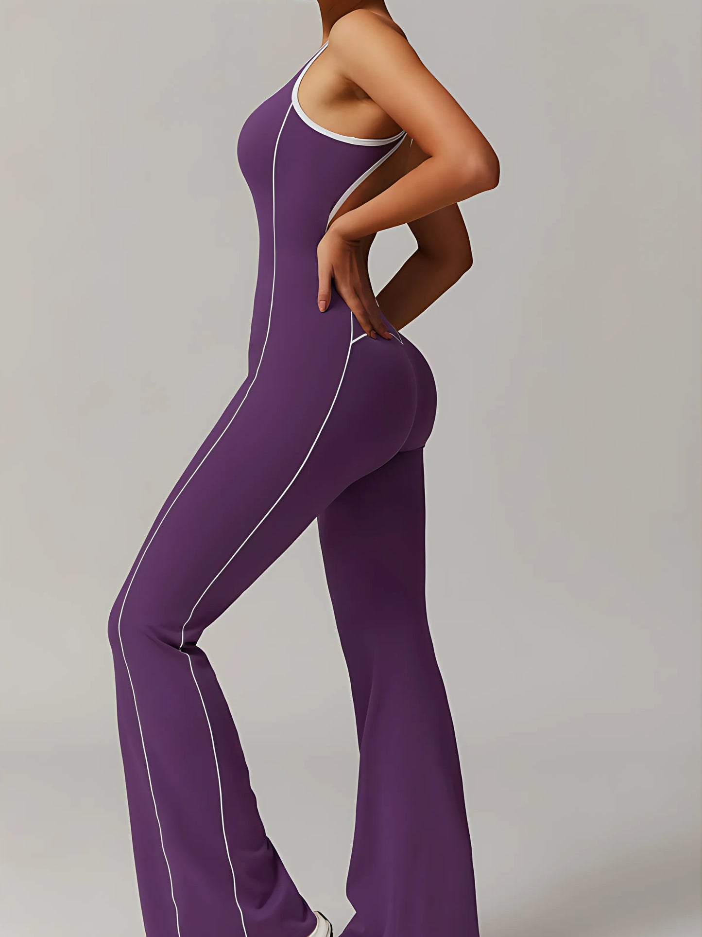 The Élan Flare Jumpsuit — Sculpting Pilates One-Piece with Open Back