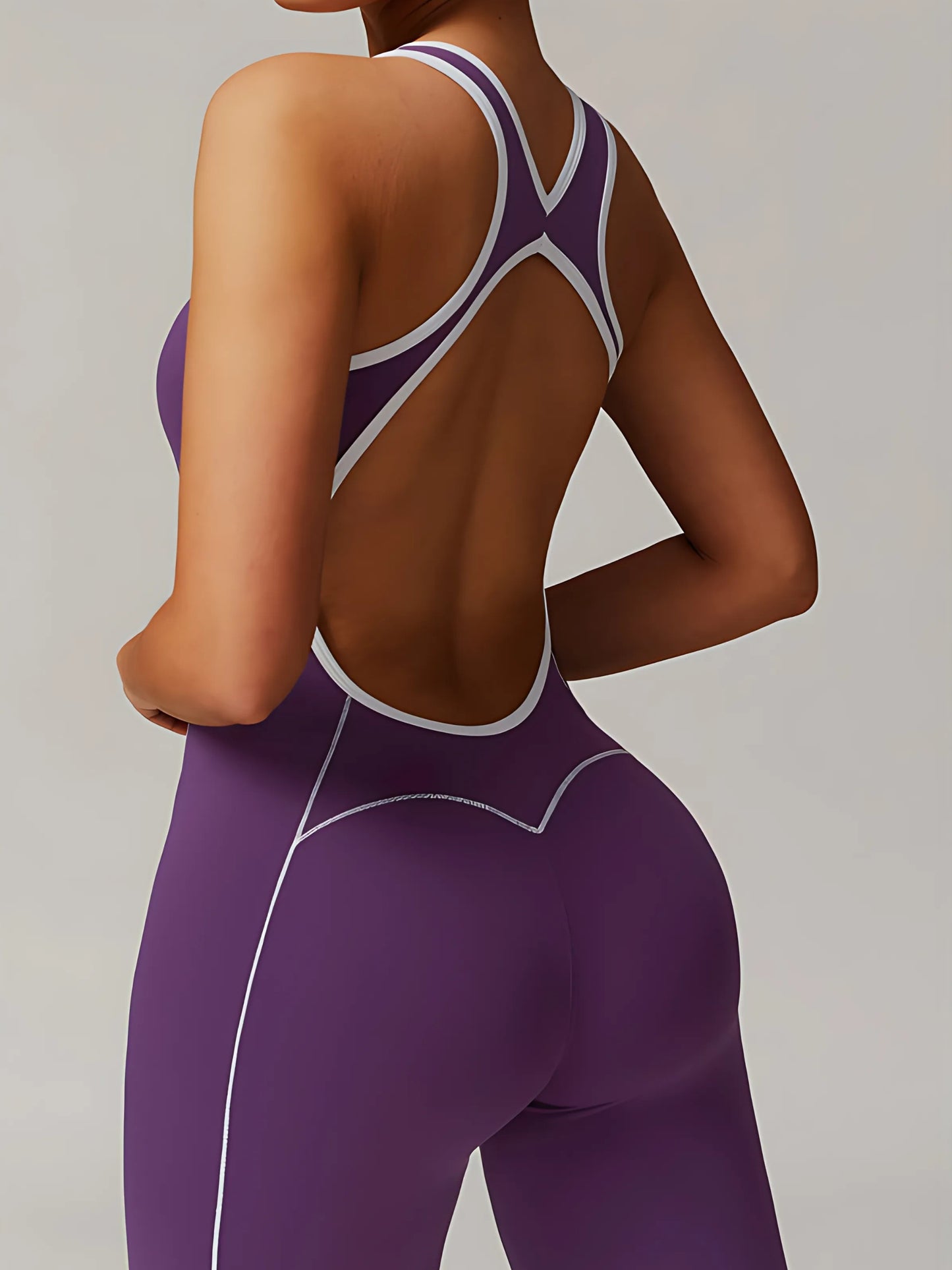 The Élan Flare Jumpsuit — Sculpting Pilates One-Piece with Open Back